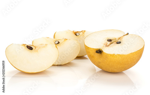 One Chinese golden pear half and three slices Nashi variety isolated on white background. photo