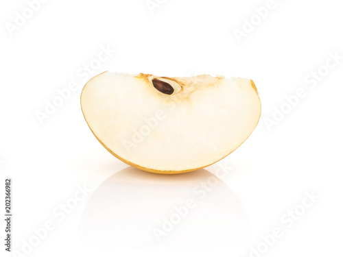 One Chinese golden pear slice Nashi variety isolated on white background. photo