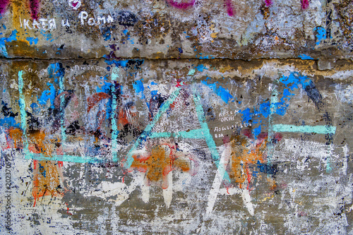 Fragment of a wall with graffiti. Abstract background. Urban street art design. Scribble
