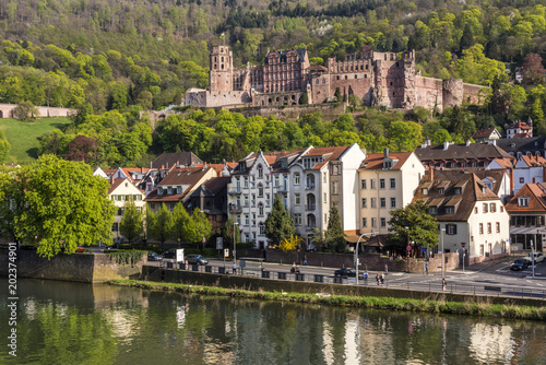 Romantic Renaissance Heidelberg castle - landmark of the famous university city, view from the old bridge across Neckar river, Germany