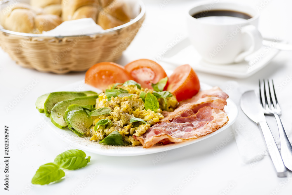 bacon and eggs with avocado and tomato, bread and coffee bacon and eggs with avocado and tomato, bread and coffee