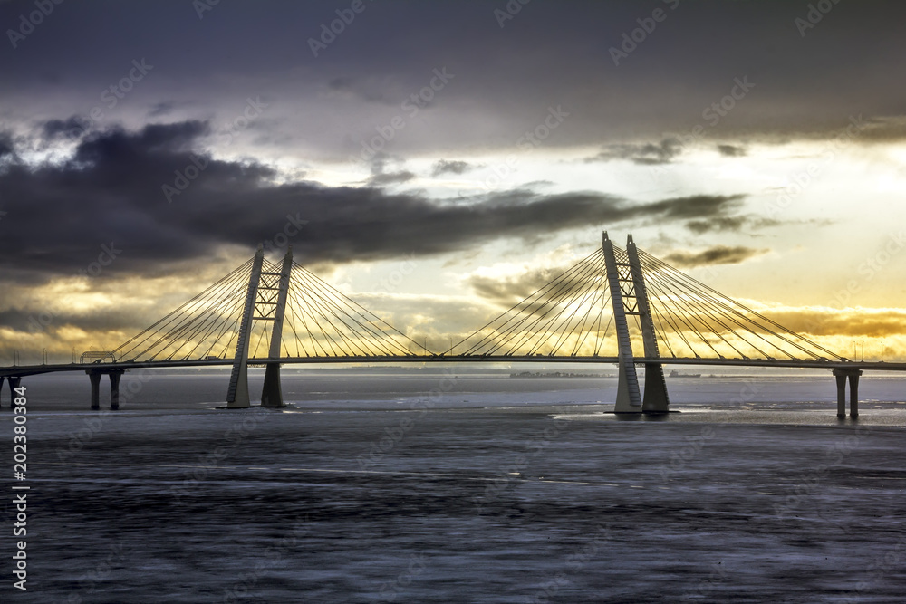 Obraz premium View on ring road and cable bridge on Vasilievsky island.