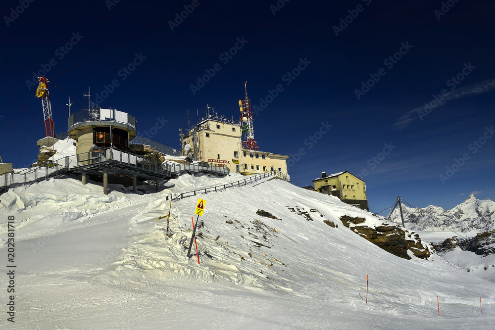 Plateau Rosa, buildings near the top station of cable car. Plateau situated  under Matterhorn peak - Monte Cervino on the border between Switzerland and  Italy Stock Photo | Adobe Stock
