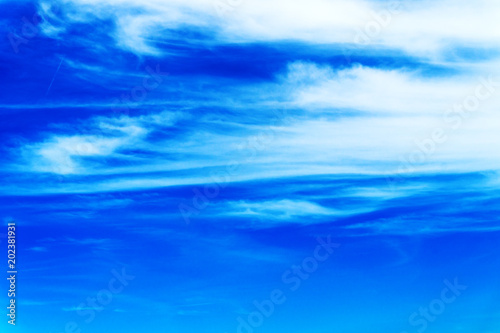 Blue sky with clouds background or texture photo