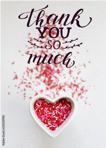 Lettering Thank You So Much with red heart in light background