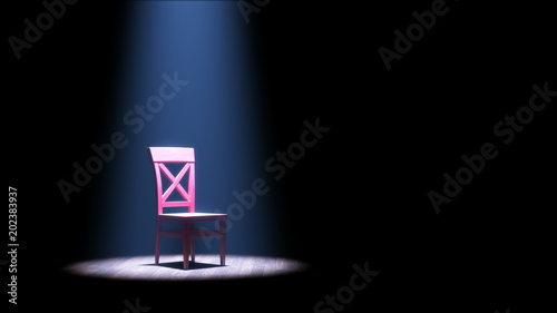 Roter Stuhl im Rampenlicht photo