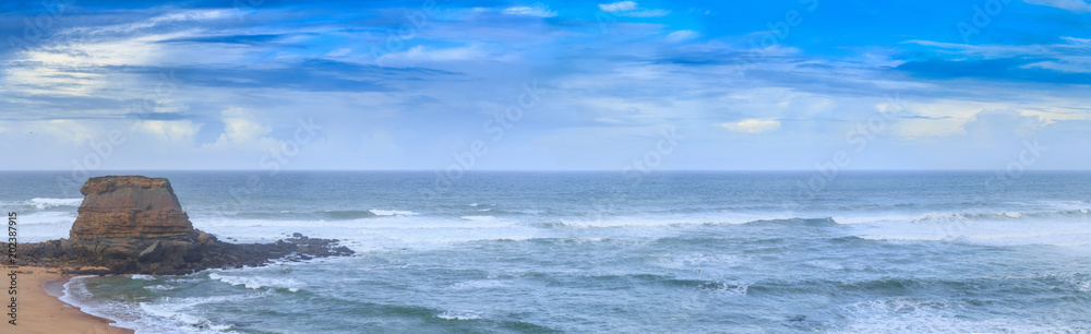 Wonderful romantic panoramic seascape coastline of Atlantic ocean. View Porto Novo beach in Vimeiro in low season at stormy weather. Oeste, municipality Lourinha in Portugal. Portugal