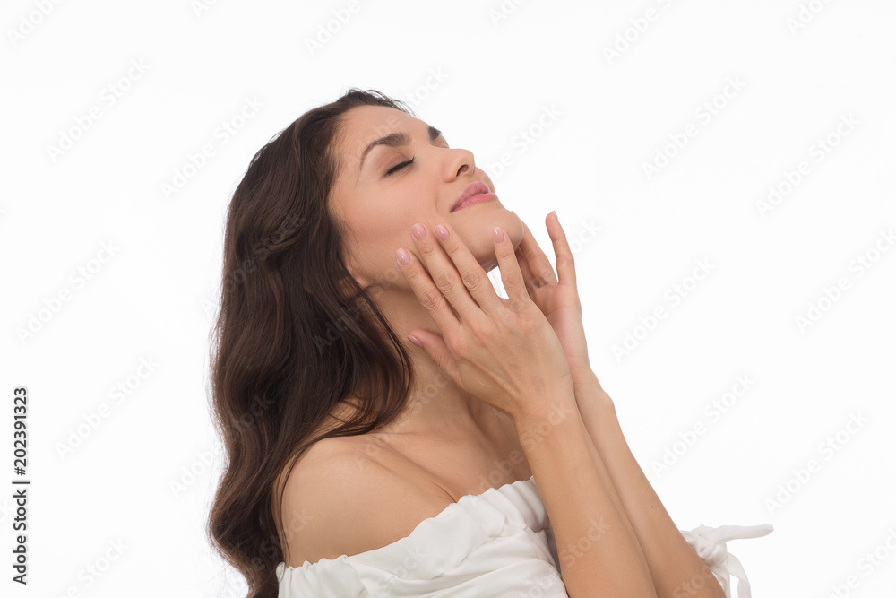 Luxury brunette with pefrect skin touching her face. Beauty concept. Mid age woman over 35 years old concept. Luxury brunette with pefrect skin touching her face. Beauty concept. Mid age woman over 35 years old concept.