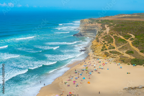 People ocean beach coastline Portugal