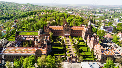 CHERNIVTSI, UKRAINE - April, 2018: Residence of Bukovinian and Dalmatian Metropolitans. Chernivtsi National University from above aerial view. Chernivtsi touristic destination of Ukraine. photo