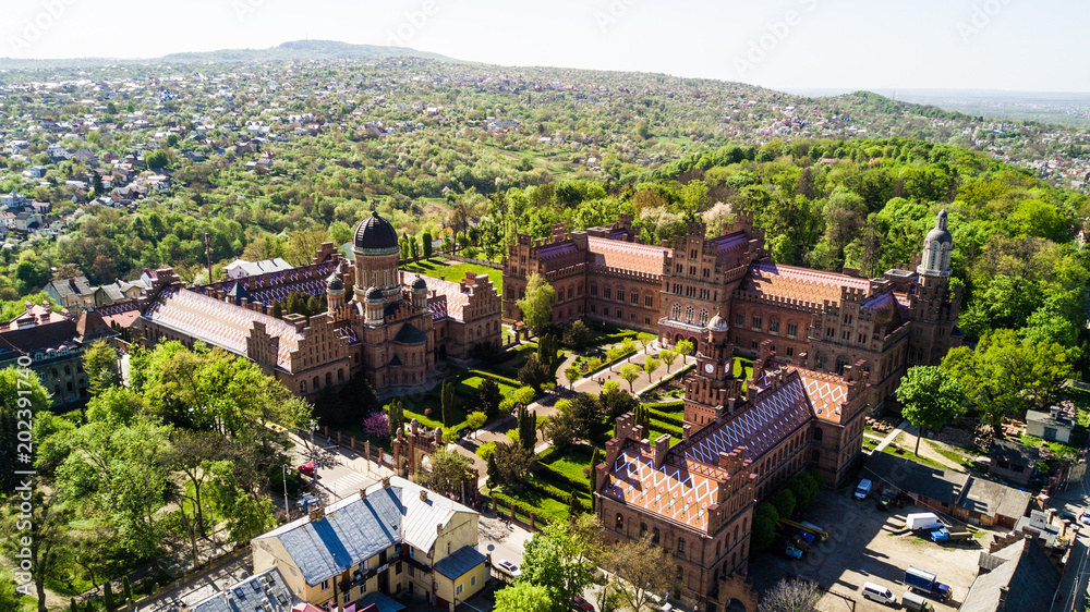 Fototapeta premium CHERNIVTSI, UKRAINE - April, 2018: Residence of Bukovinian and Dalmatian Metropolitans. Chernivtsi National University from above aerial view. Chernivtsi touristic destination of Ukraine.