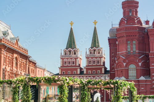 Fototapeta Naklejka Na Ścianę i Meble -  Voskresenskie gates and Hystorical museum on Red Square, beautiful decotation on Manezhnaya Square in Moscow, Russia