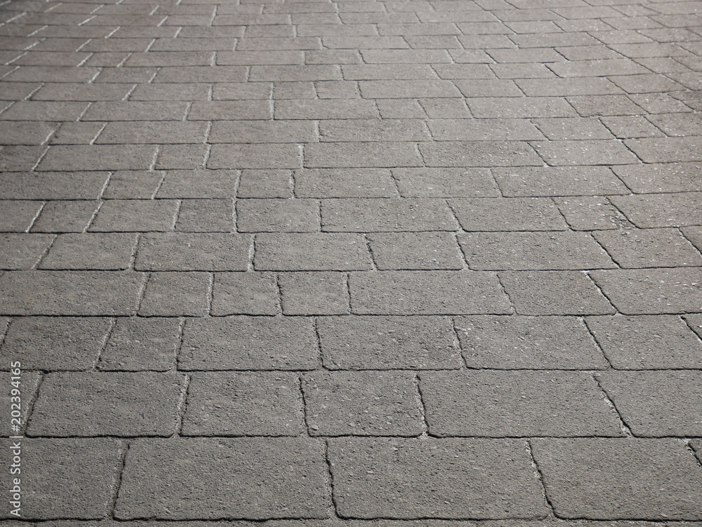 Gray wet concrete pavement