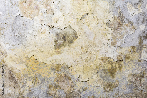 relief texture of the old antique wall, destruction and peeling plaster, damage to the stratum layer