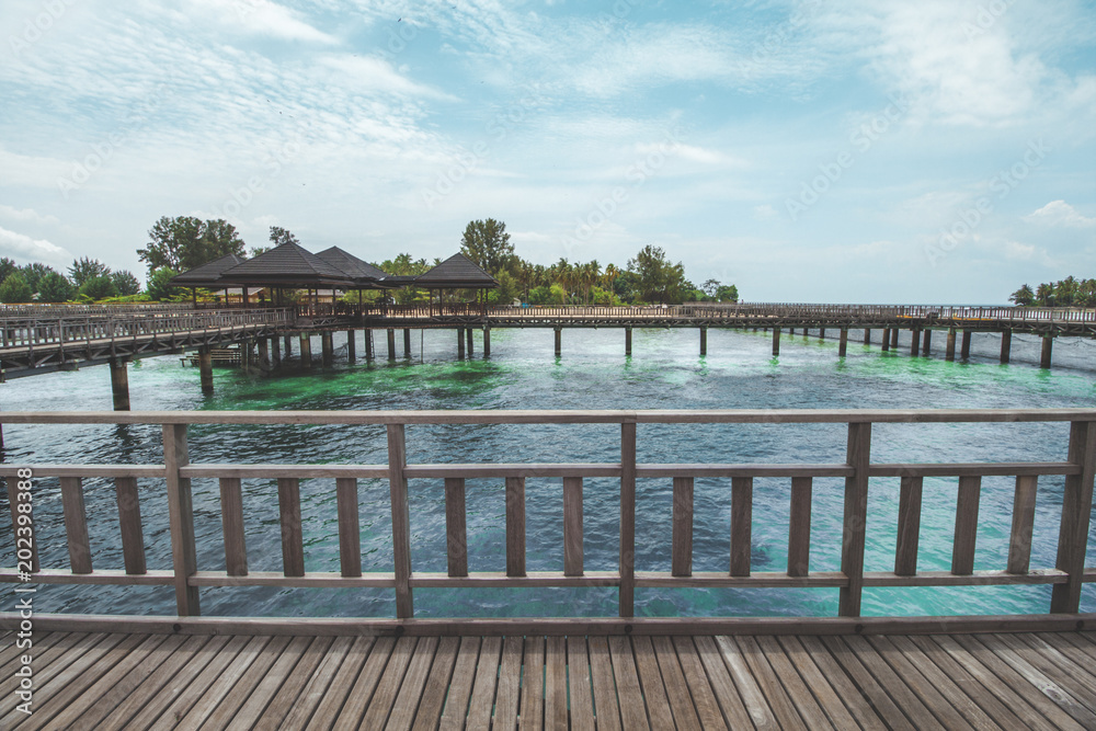 Wooden Pier at Tropical Beach Wooden Pier at Tropical Beach