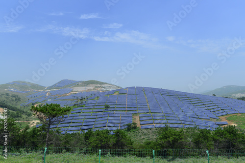 Solar power equipment, on the hillside © hanmaomin