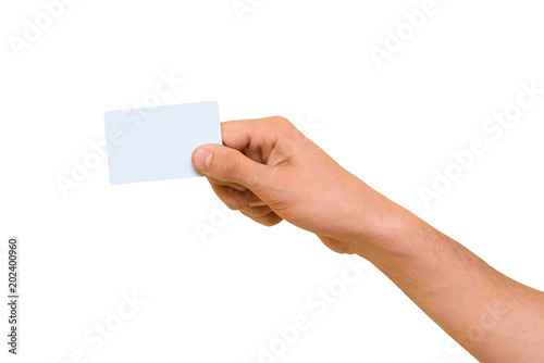 Male hand holding business card, isolated on white