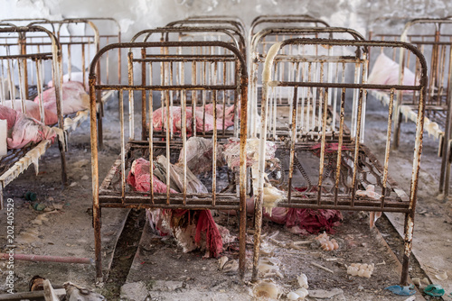 Abandoned kindergarten in Chernobyl exclusion zone. Kopachi village. Ex Soviet interior. Legacy of USSR. Chernobyl exclusion zone. Pripyat. Ukraine. Violence against children. Atmosphere of fear.