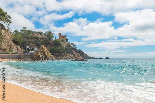 Lloret de Mar Castell Plaja at Sa Caleta beach in costa Brava of Catalonia, Spain photo