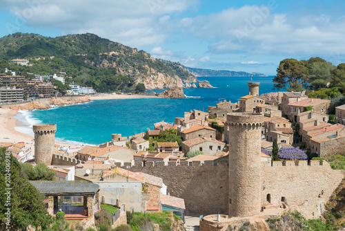 Aerial view of Fortress Vila Vella and Badia de Tossa bay at summer in Tossa de Mar on Costa Brava, Catalonia, Spain