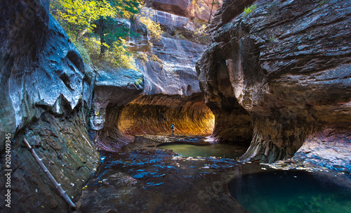A man standing at the Subway, Zion National park photo