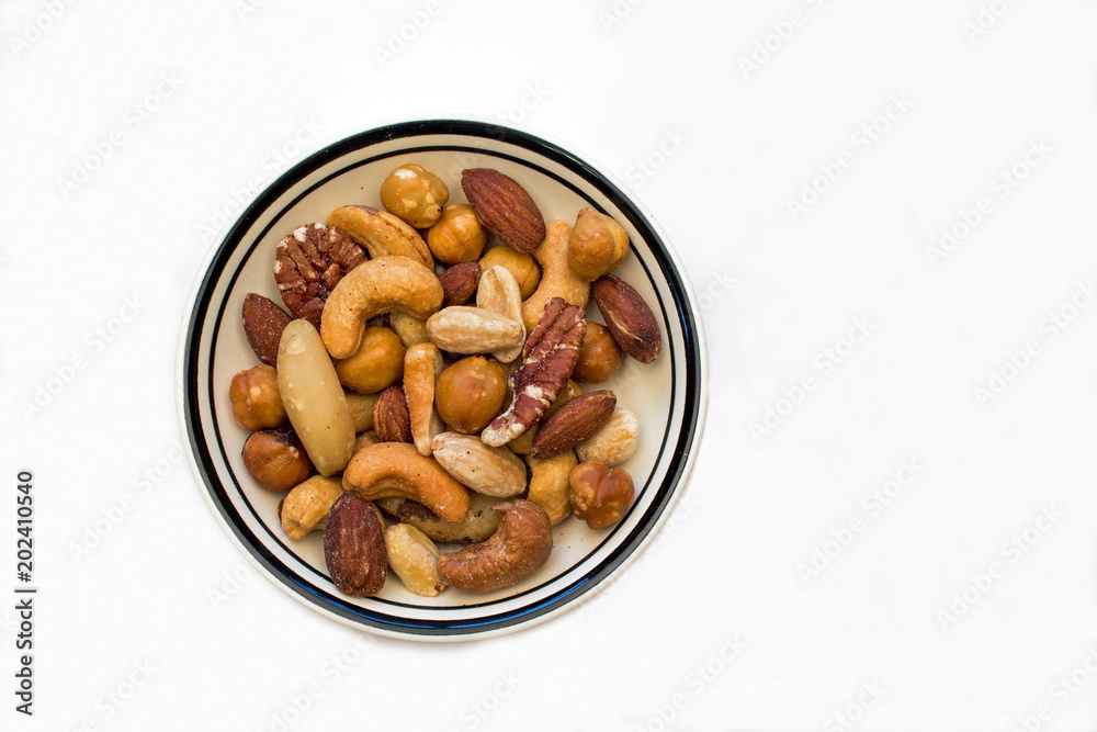 Bowl of Mixed Nuts on a White Background Bowl of Mixed Nuts on a White Background
