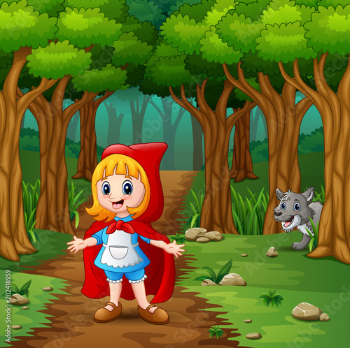 Girl hooded red and wolves at forest