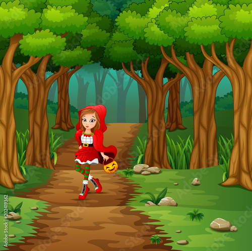 Women red hooded at the street forest