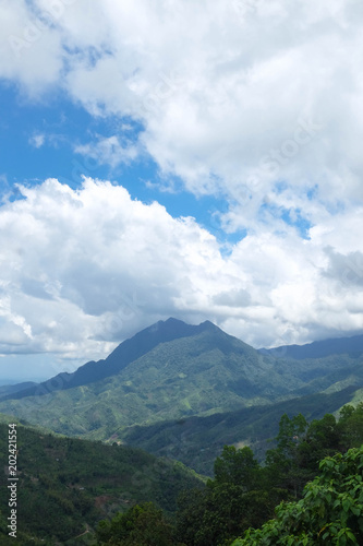 Tropical mountain and hills with beautiful clouds