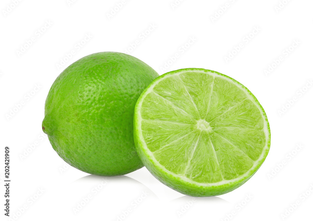 whole and half fresh green lime isolated on white background