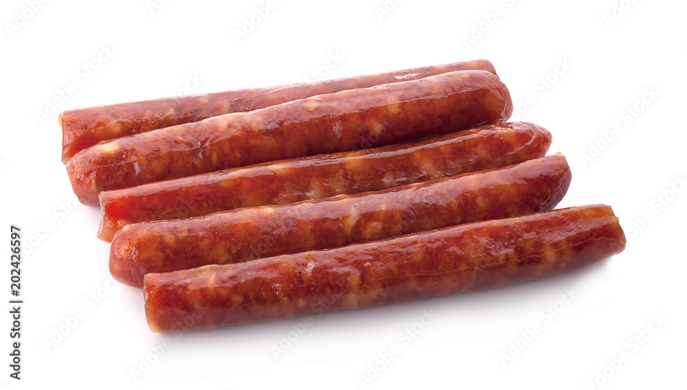 Stack of smoked sausages isolated on a white background Stack of smoked sausages isolated on a white background