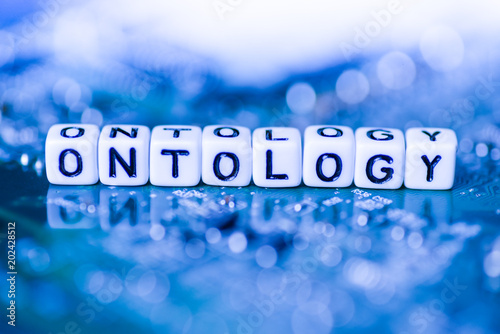 Canvastavla Word ONTOLOGY formed by alphabet blocks on mother cryptocurrency