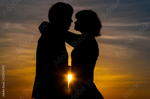 Silhouette of a Couple In Love at Sunset