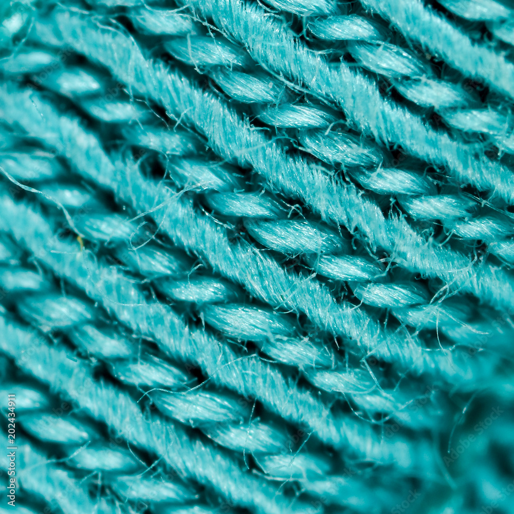 Obraz premium Blue fabric fabric as an abstract background. Macro
