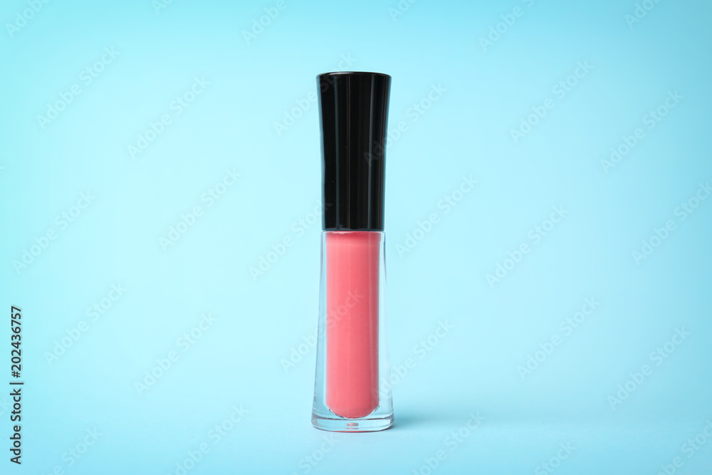 Beautiful lip gloss on color background Beautiful lip gloss on color background