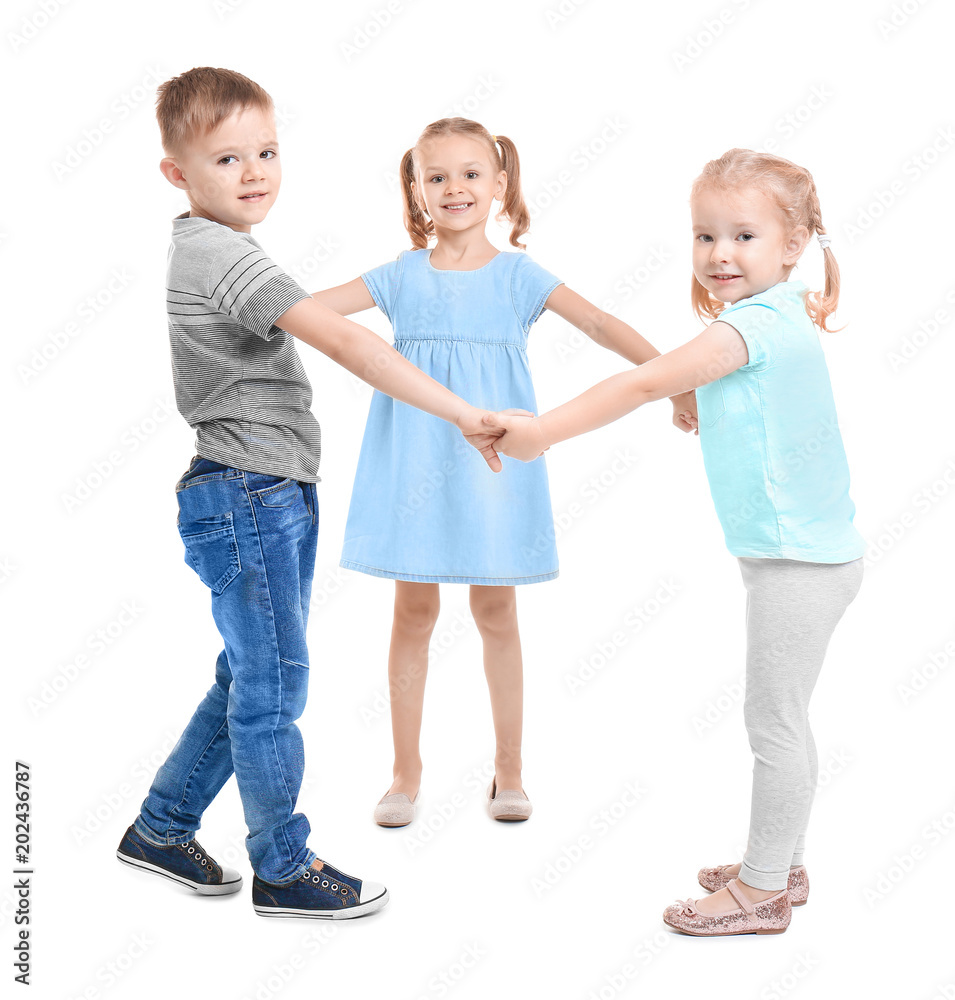 Cute little children playing on white background Cute little children playing on white background