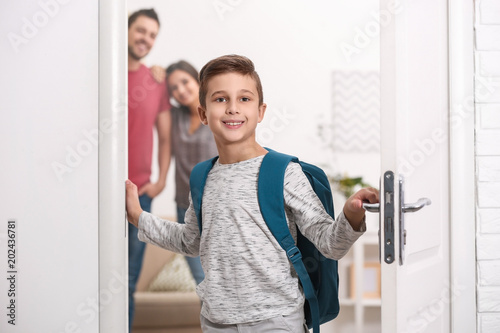 Cute little boy with backpa...