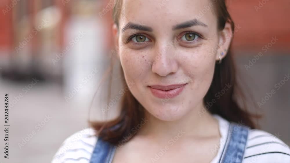 Close-up portrait of beautiful caucasian smiling girl Close-up portrait of beautiful caucasian smiling girl