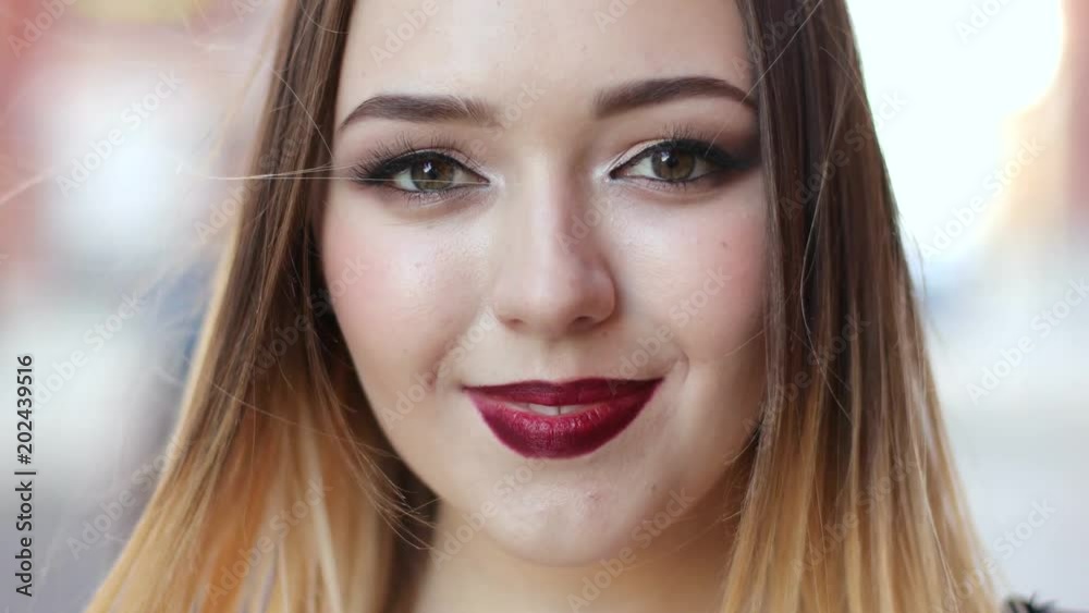 Close-up portrait of beautiful caucasian smiling woman Close-up portrait of beautiful caucasian smiling woman