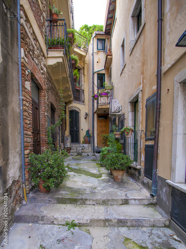 Fototapeta Naklejka Na Ścianę i Meble -  View of the downtown street of Taormina (Sicily)