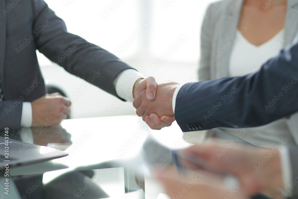 confident handshake of business partners confident handshake of business partners