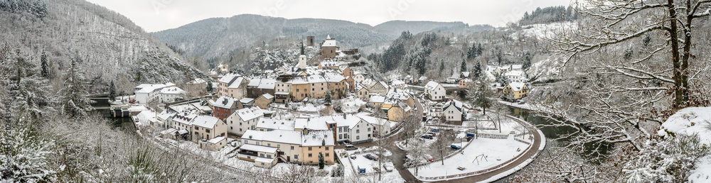 Panoramic view of snow covered Esch sur sure town in Luxembourg