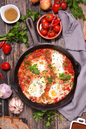 baked egg with tomato and bell pepper