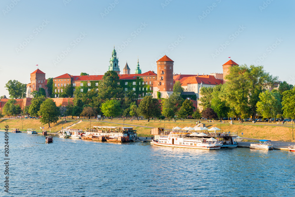 Krakow, Poland - August 11, 2017: beautiful view of Wawel Castle, located on a hill, picture at sunset