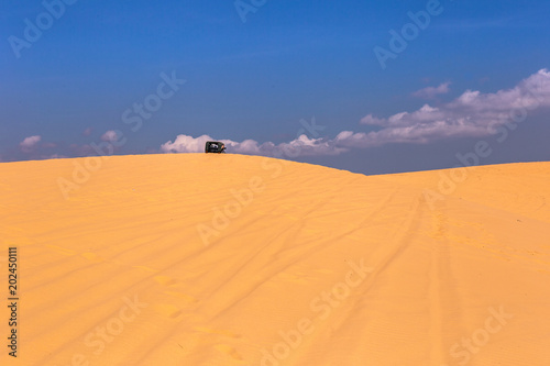 Desert and streaks in Mui Ne, Vietnam is a summer tour where Asian people can enjoy the place.