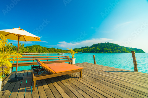 Beautiful tropical beach and sea with coconut palm tree in paradise island