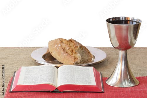 Open Bible, bread and caliche photo