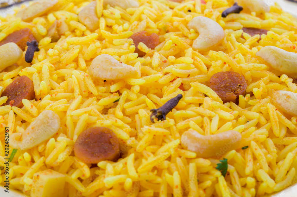 Indian Cuisine Pulao Also Know as Pulav, Vegetarian Biryani, Veg Pulav, Vegetable Pulav, Biriyani or Vegetable Rice is a Spicy Rice Dish Prepared By Cooking Rice with Various Vegetables And Spices Indian Cuisine Pulao Also Know as Pulav, Vegetarian Biryani, Veg Pulav, Vegetable Pulav, Biriyani or Vegetable Rice is a Spicy Rice Dish Prepared By Cooking Rice with Various Vegetables And Spices