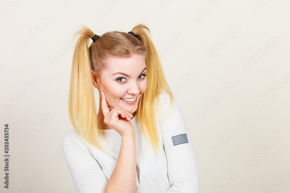 Happy blonde teenager girl with ponytails Happy blonde teenager girl with ponytails