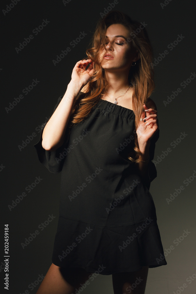 Stylish beauty portrait of a fashionable girl with makeup and hair Stylish beauty portrait of a fashionable girl with makeup and hair